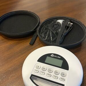 Klim Nomad Bluetooth Rechargeable CD player with case and cords